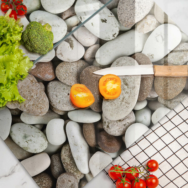 Skleněná krájecí deska Malé kameny pozadí