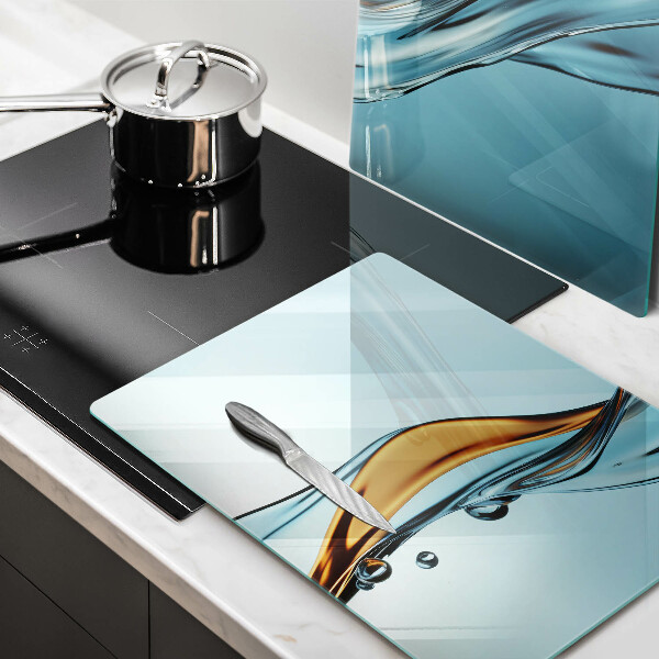 Krájecí prkénko skleněné Voda na modrém pozadí