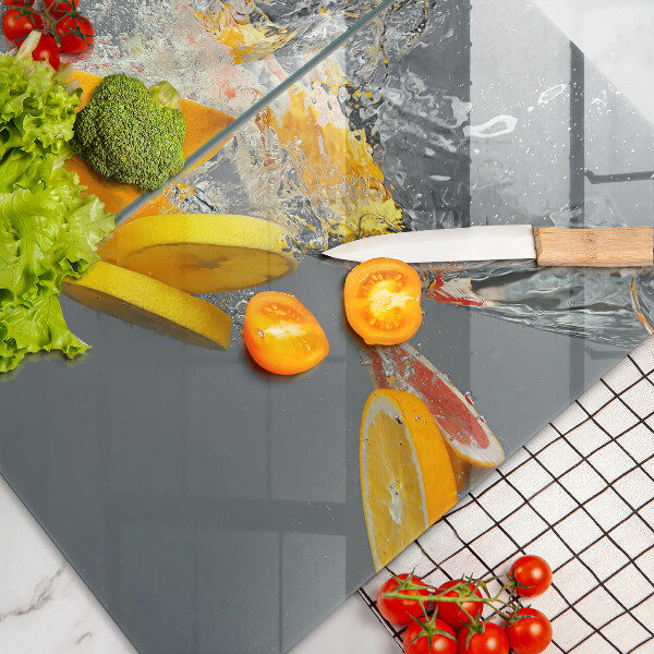 Skleněné krájecí prkénko Citrony ve vodě