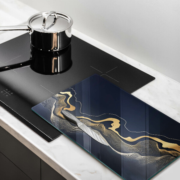 Skleněná deska do kuchyně Abstraktní zlaté čáry