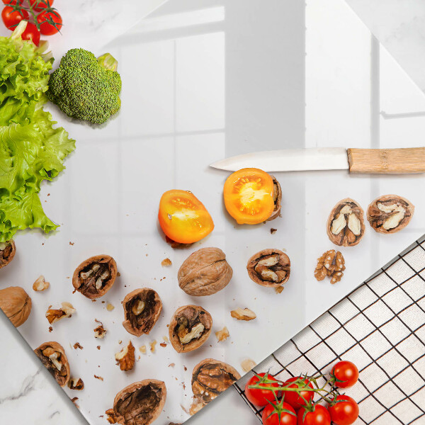 Skleněná deska do kuchyně Ořechy na bílém pozadí