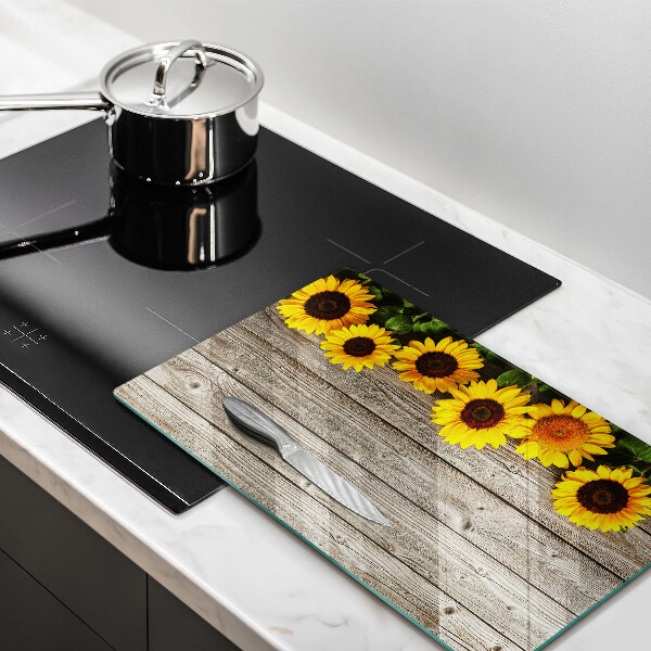 Skleněná deska do kuchyně Slunečnice na prknech