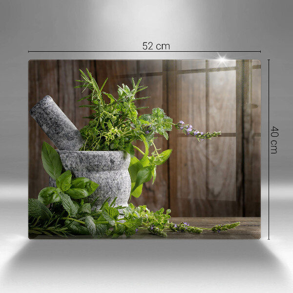 Skleněná deska do kuchyně Pěstuje bylinky a dřevo