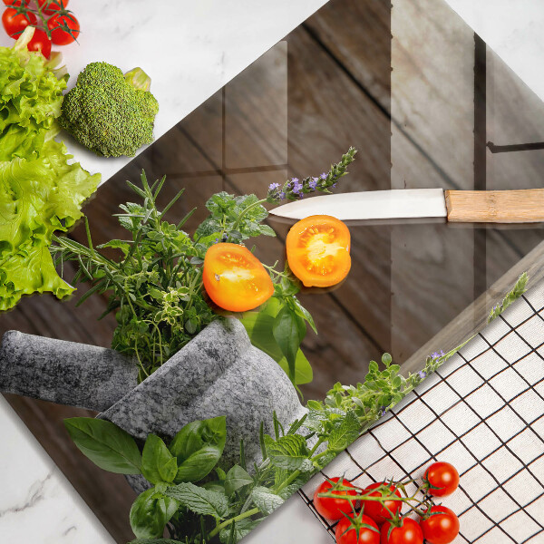 Skleněná deska do kuchyně Pěstuje bylinky a dřevo