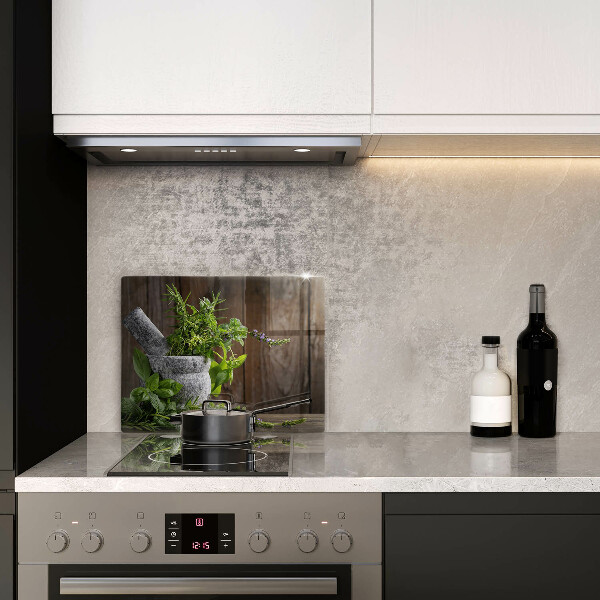 Skleněná deska do kuchyně Pěstuje bylinky a dřevo