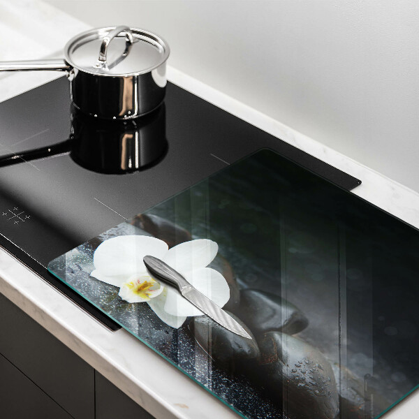 Skleněná krájecí deska Bílý květ zen kameny