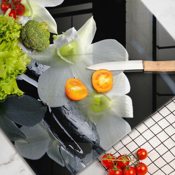 Skleněná krájecí deska Bílé květy v zenové vodě