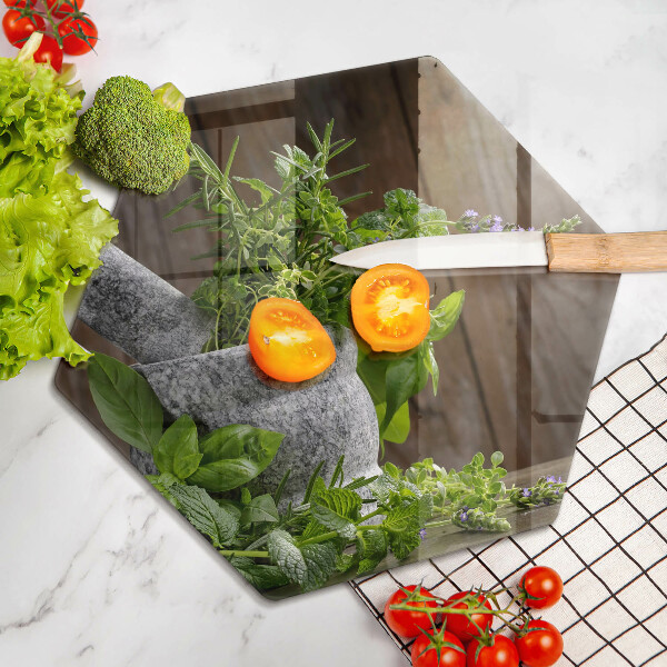 Skleněná deska do kuchyně Pěstuje bylinky a dřevo