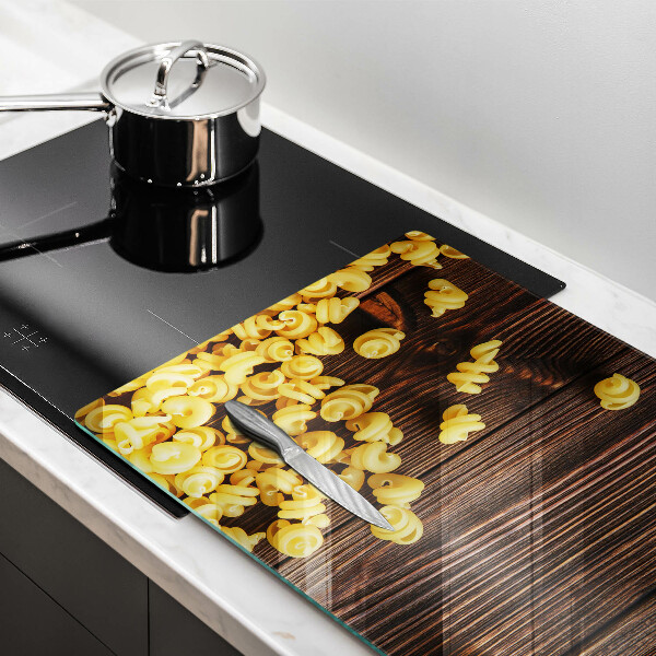 Skleněná deska za sporák Těstoviny na stole