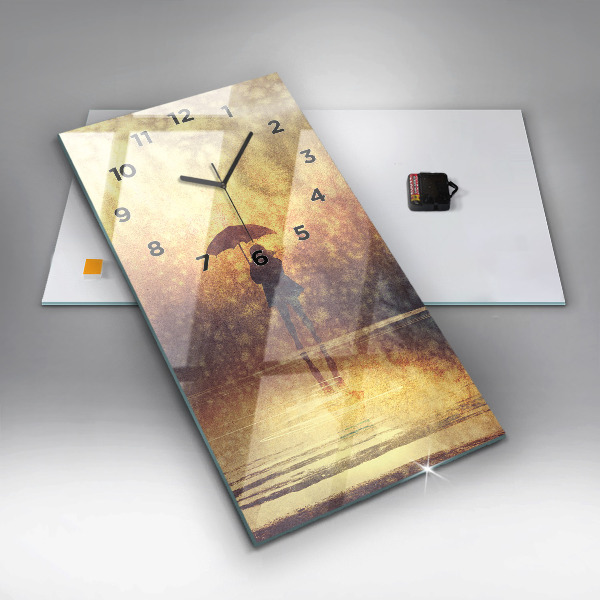 Vertikální skleněné hodiny žena s deštníkem