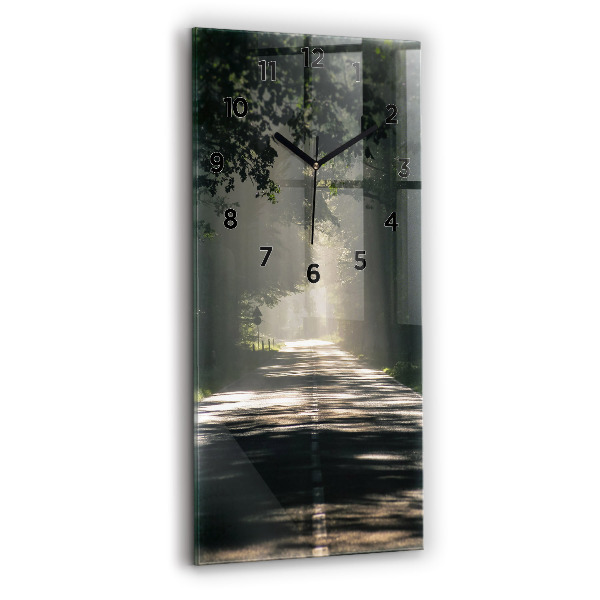Vertikální nástěnné hodiny Lesní cesta a pruhy slunce
