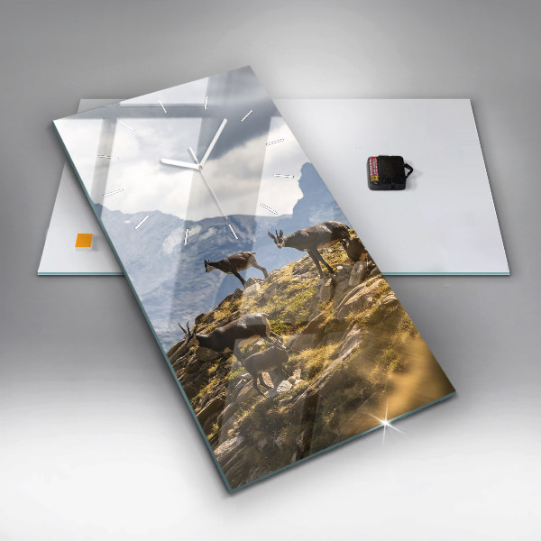 Vertikální nástěnné hodiny Koza v údolí Aosta