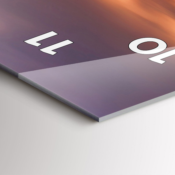 Vertikální nástěnné hodiny Panorama města na západ