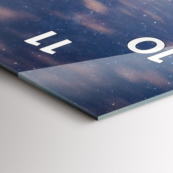 Vertikální nástěnné hodiny Hory při západu slunce