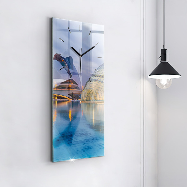 Vertikální nástěnné hodiny Západ slunce ve městě