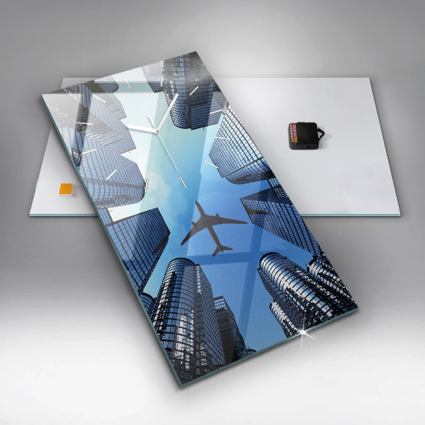 Vertikální skleněné hodiny Letadlo nad budovami