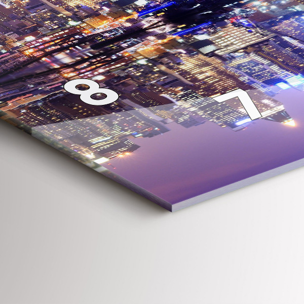 Horizontální hodiny na skle New York v noci