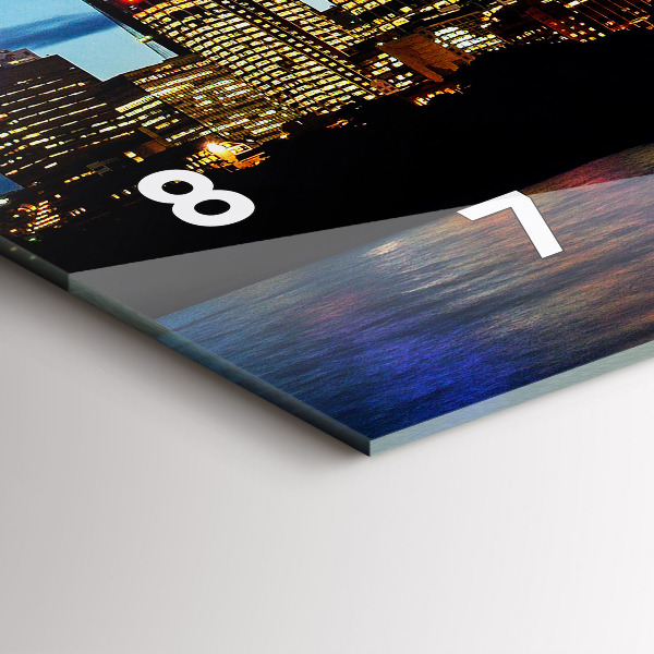 Horizontální hodiny na skle Sydney večer