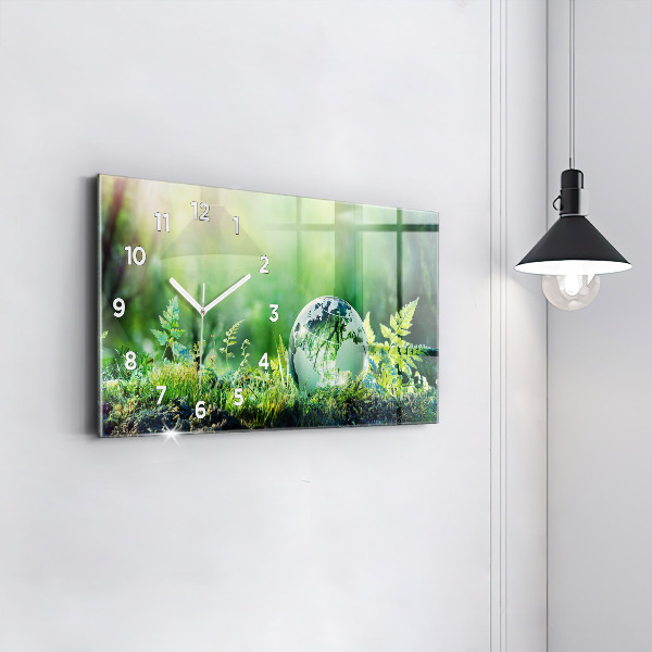 Horizontální hodiny na skle Zeměkoule
