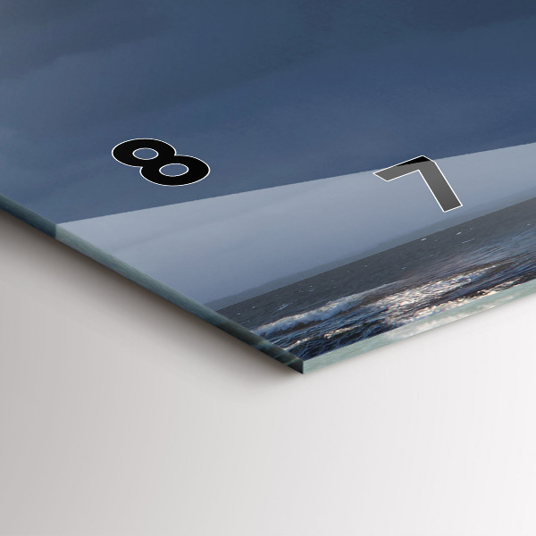 Horizontální hodiny na skle Maják