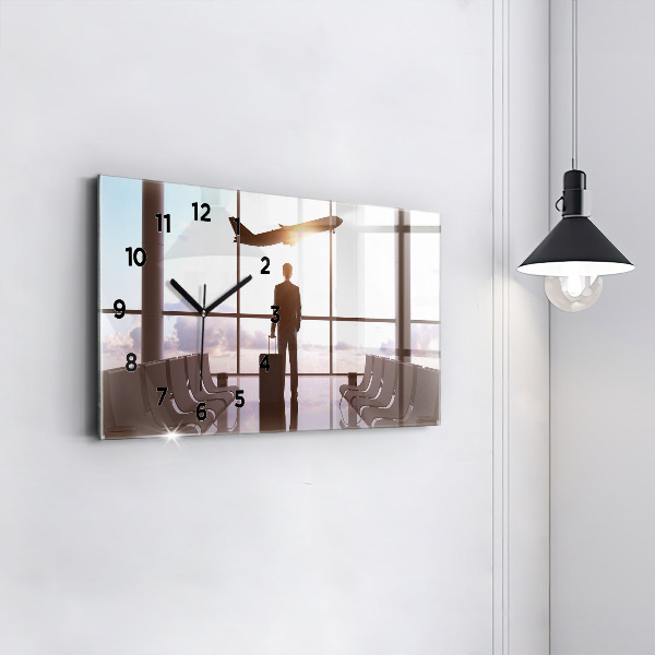 Horizontální hodiny na skle Muž na letišti