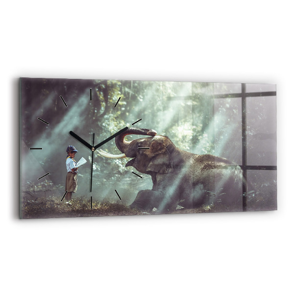 Horizontální skleněné hodiny na stěnu Chlapec si čte knihu