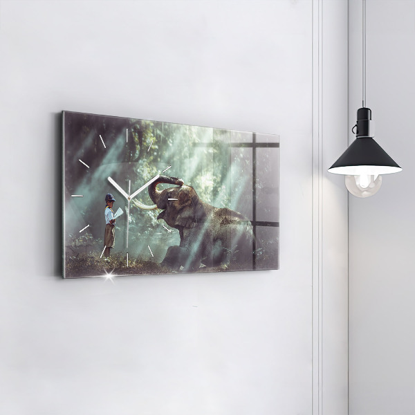 Horizontální skleněné hodiny na stěnu Chlapec si čte knihu