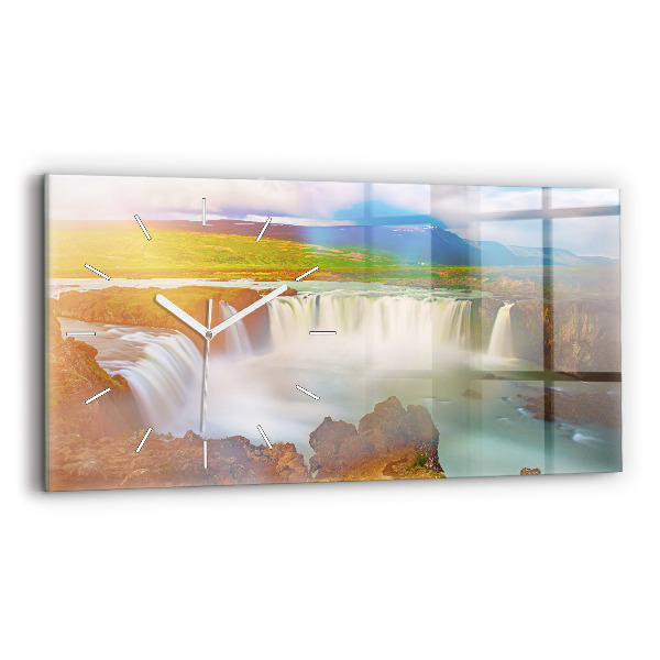 Horizontální hodiny na skle Godafoss na Islandu