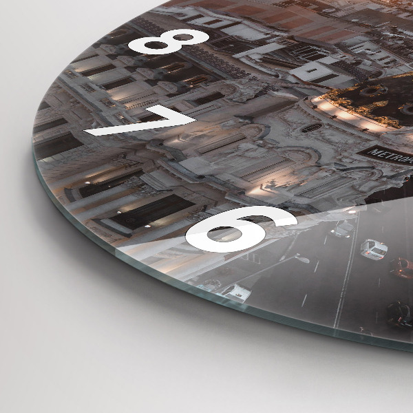 hodiny na skle Města při západu slunce