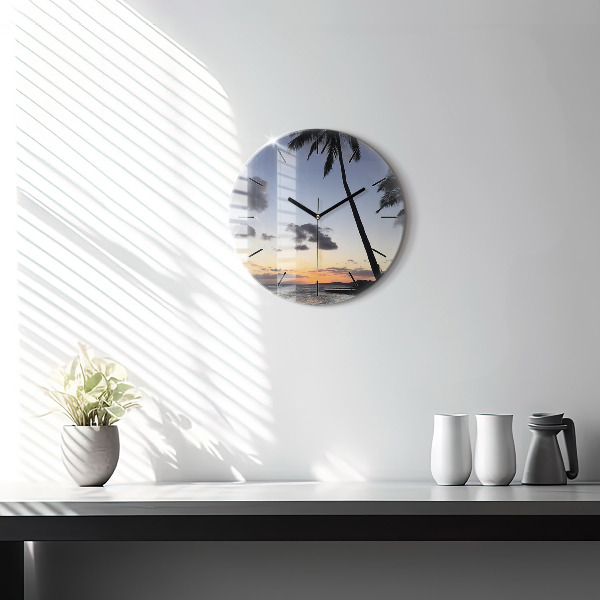 hodiny na skle Palma a východ slunce