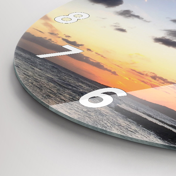 hodiny na skle Palma a východ slunce