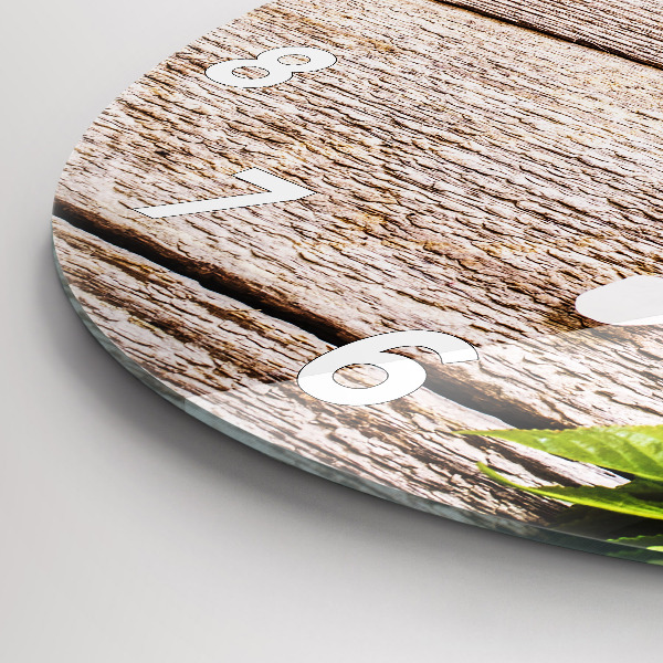 Kulaté skleněné hodiny s fotkou Květiny na dřevě