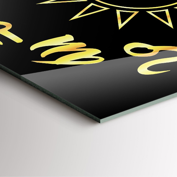 Skleněné nástěnné hodiny Zlatá astrologická znamení na černém pozadí.